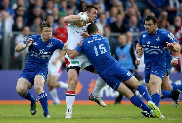 Rob Kearney and Brian O'Driscoll tackle Tommy Bowe