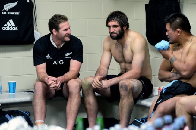 Kieran Read, Sam Whitelock and Keven Mealamu celebrate in the dressing room