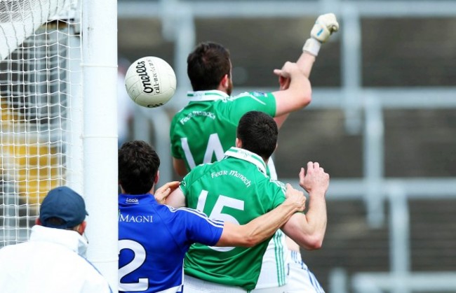 Fermanagh score the first goal of the game following a goalmouth scramble