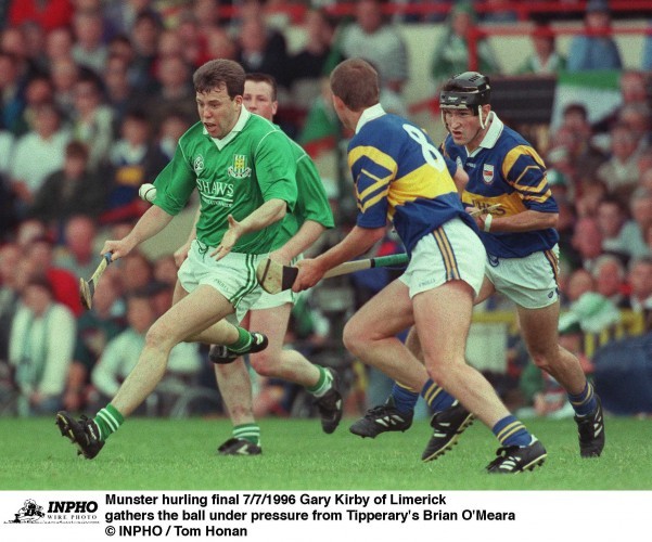 Gary Kirby of Limerick and Tipperary's Brian O'Meara