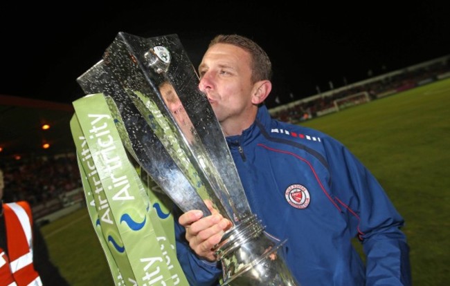 Ian Baraclough celebrates with the trophy