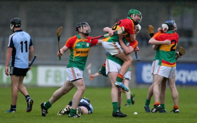 Carlow players celebrate at the final whistle