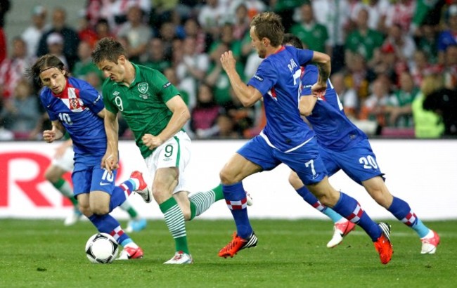 Kevin Doyle with Luka Modric, Ivan Perisic and Ivan Rakiticof