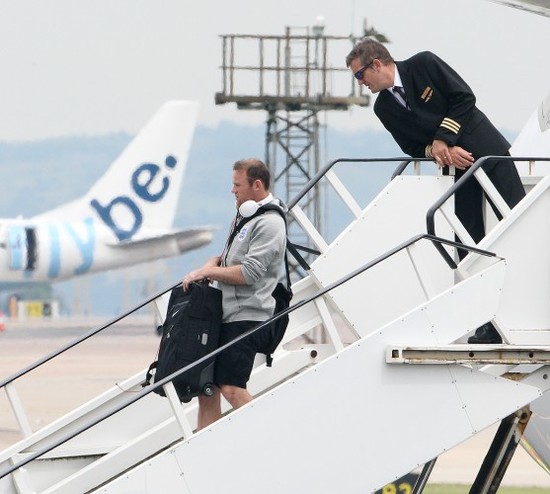 Soccer - England Return Home - Manchester Airport