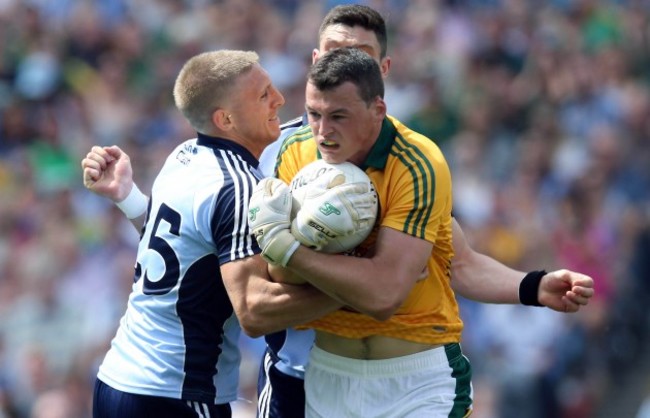 Paddy O'Rourke with Eoghan O'Gara and Diramuid Connolly