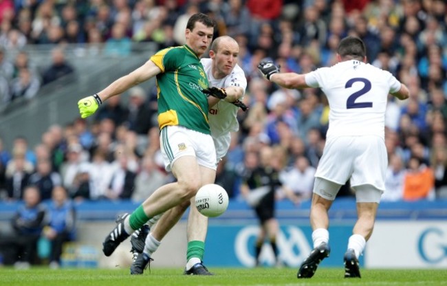 Paddy O'Rourke under pressure from Hugh McGrillen