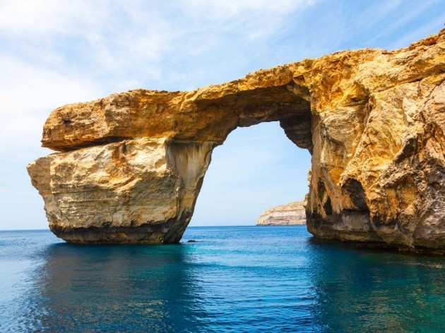 snap-a-photo-at-the-azure-window-a-natural-limestone-arch-on-the-maltese-island-of-gozo