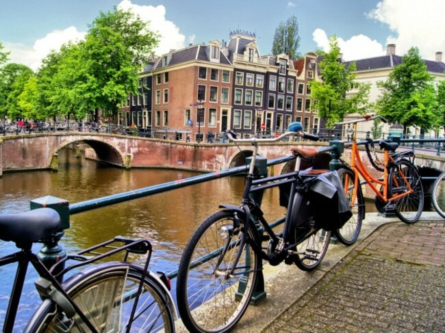 bike-alongside-the-canals-of-amsterdam-netherlands