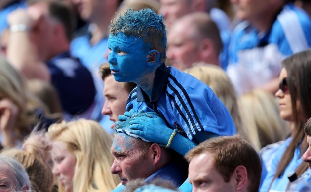 A young Dublin supporter looks on Ê