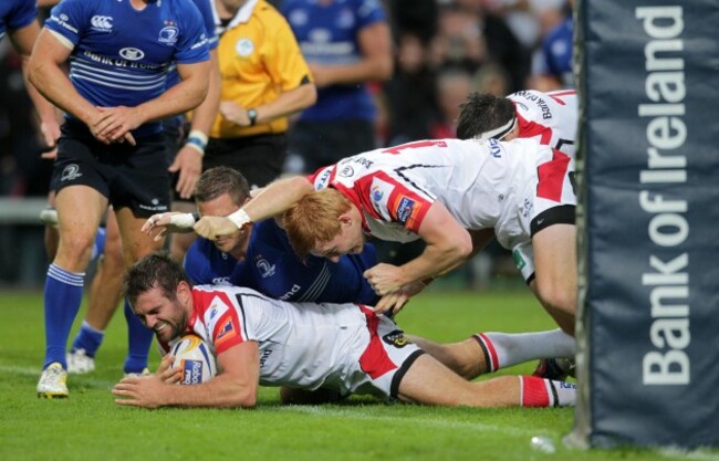 Jared Payne drives over to score the try