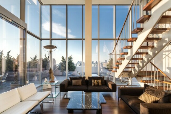 inside-theres-a-modern-staircase-made-of-steel-and-glass
