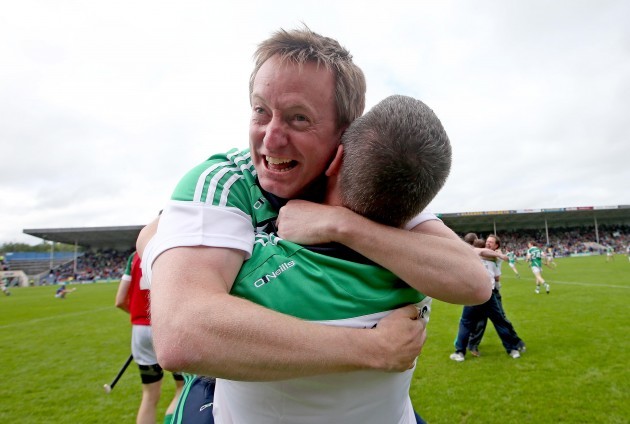 TJ Ryan celebrates with selector Paul Beary at the final whistle