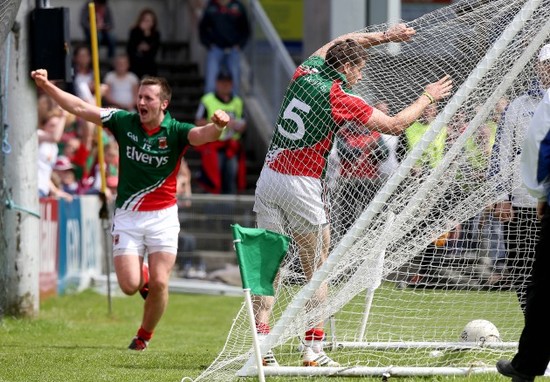 Lee Keegan hits the back of the net after scoring a goal as Cillian O'Connor celebrates setting him up