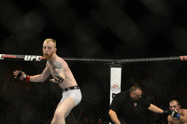 Patrick Holohan celebrates stopping Josh Sampo