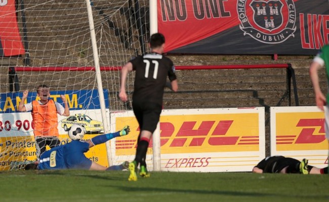 Bohemians' Steven Beattie scores the first goal past Mark McNulty but gets injured in the process 25/72014