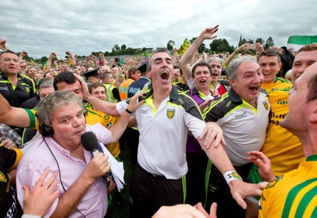 Jim McGuinness celebrates with players