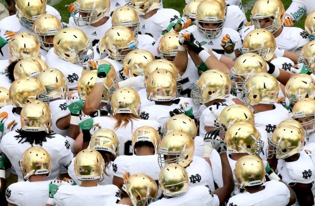 The Notre Dame team huddle before the game