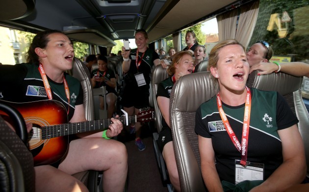 Paula Fitzpatrick and Orla Fitzsimons singing a song on the team bus