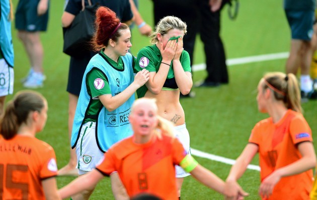 Savannah McCarthy is consoled by Shannon Carson after the game 24/7/2014