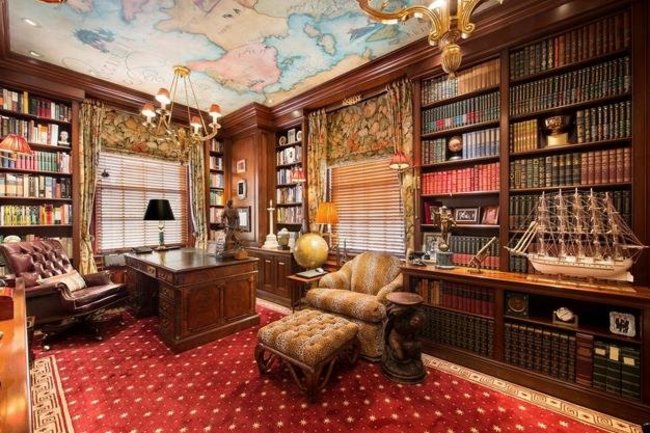 the-library-includes-mahogany-bookshelves-and-window-frames
