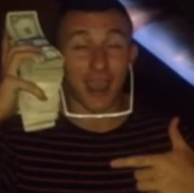 he-held-a-stack-of-money-up-to-his-ear-like-a-phone-after-getting-drafted