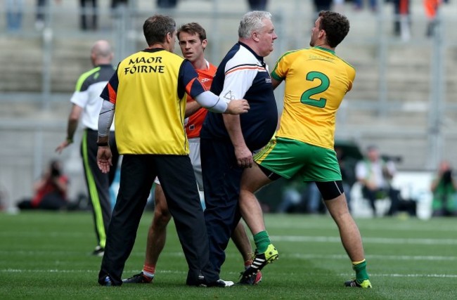 Paul Grimley clashes with Eamonn McGee