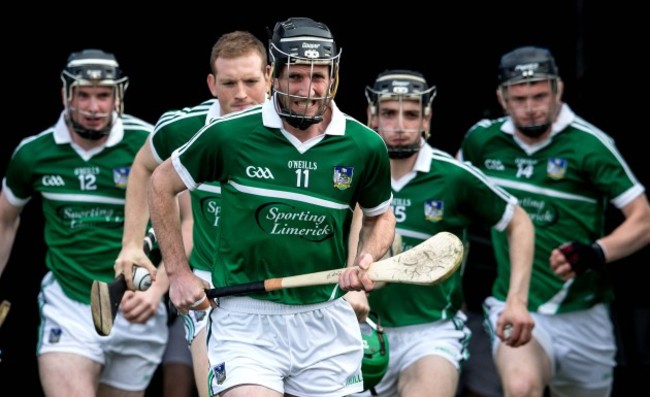 Donal O'Grady leads out Declan Hannon, Shane Dowling, Sean Tobin and Kevin Downes before the game