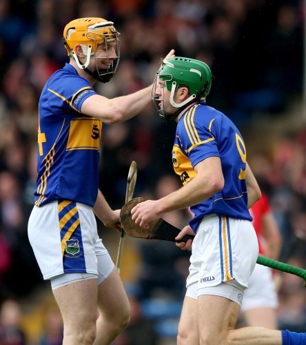 Seamus Callanan and James Woodlock celebrate after their sides second goal