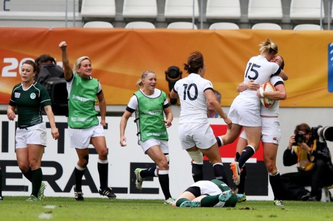 Emily Scarratt celebrates her try with Danielle Waterman