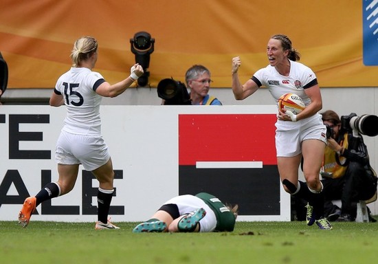 Emily Scarratt celebrates her try with Danielle Waterman