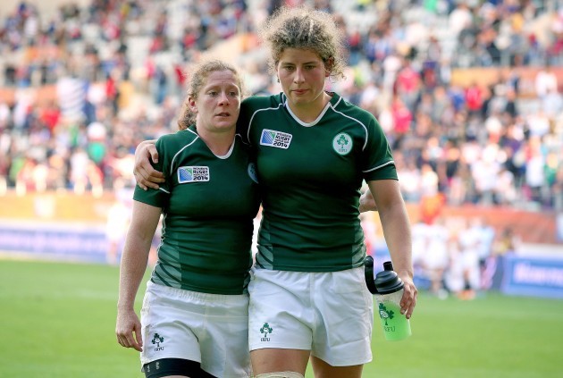 Grace Davitt and Jenny Murphy leave the field after the game