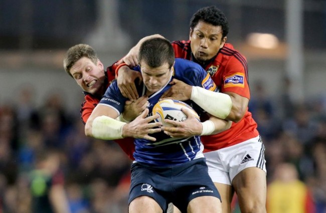 Ronan O'Gara and Casey Laulala tackle Shane Jennings