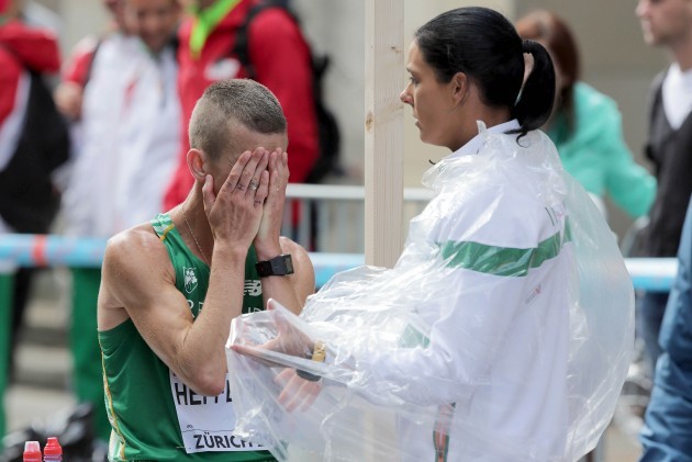 Rob Heffernan with Marian Heffernan after withdrawing from the