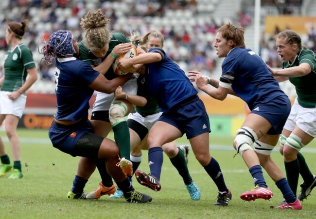 Jenny Murphy gets tackled by Safi N'Diaye