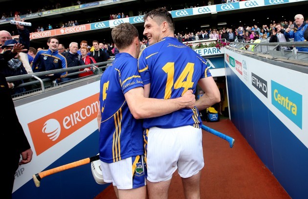 Brendan Maher and Seamus Callanan celebrate as the go down the tunnel after the game