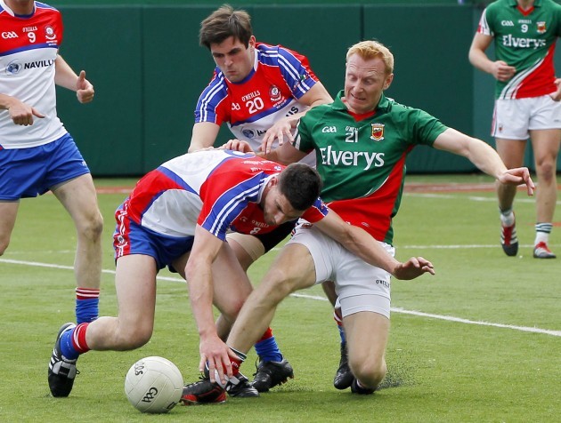 Brendan Quigley and Niall Farrell tackled Richie Feeney
