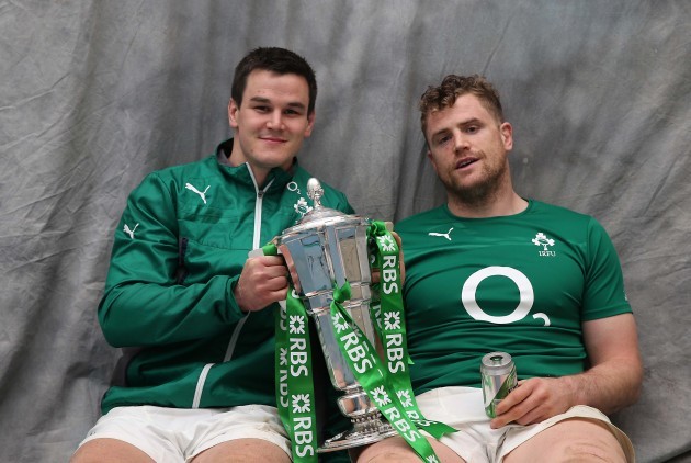Jonathan Sexton and Jamie Heaslip with the trophy