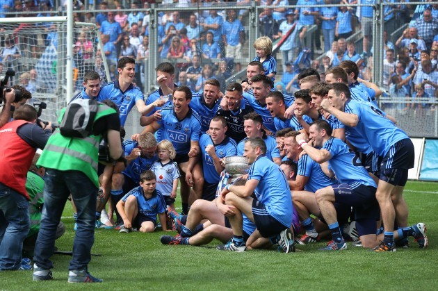 Dublin players celebrate with the cup