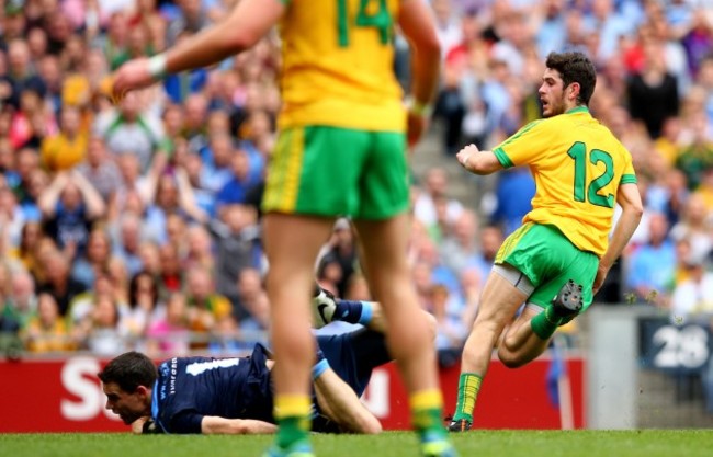 Ryan McHugh scores his side's first goal past goalkeeper Stephen Cluxton