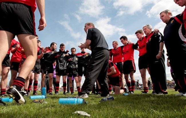 James McCartan talks to his team