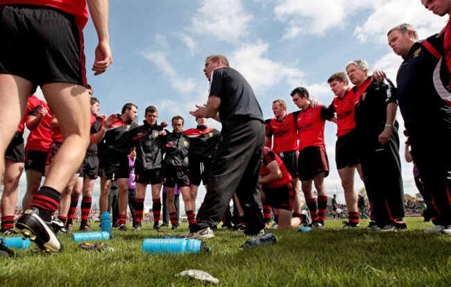 James McCartan talks to his team