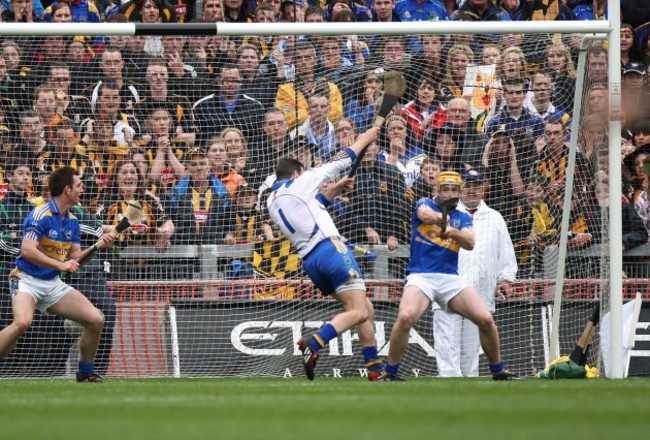 Conor O'Mahony, Brendan Cummins and Padraic Maher fail to stop the Henry Shefflin first goal from a penalty