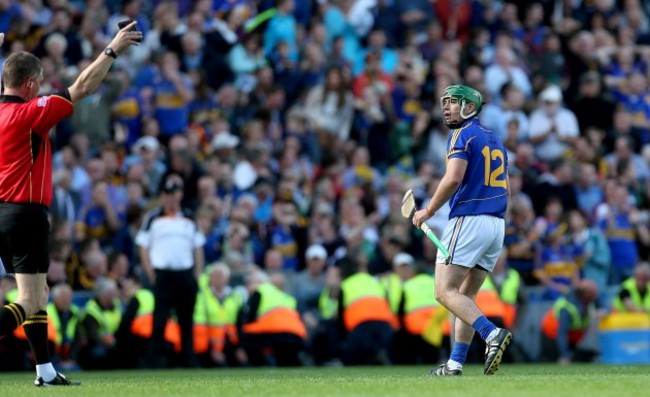 John OÕDwyer gestures to the referee Barry Kelly for calling the hawk eye system into play