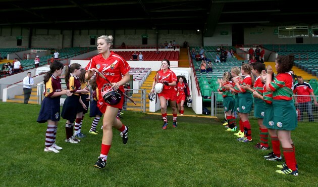 Anna Geary leads out her team