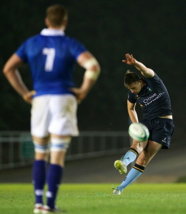 Ross Byrne takes a penalty kick