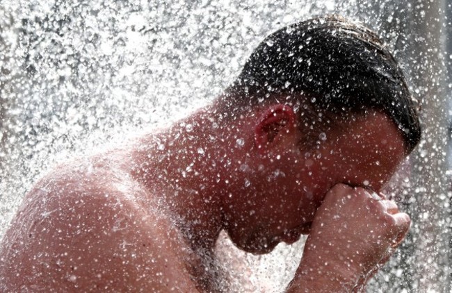 General view of competitors showering after the race