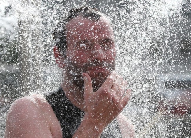 General view of competitors showering after the race