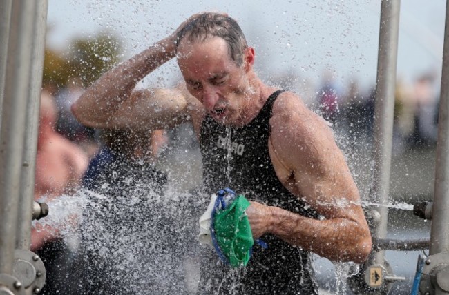 General view of competitors showering after the race