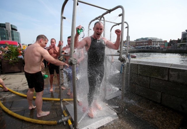 General view of competitors showering after the race