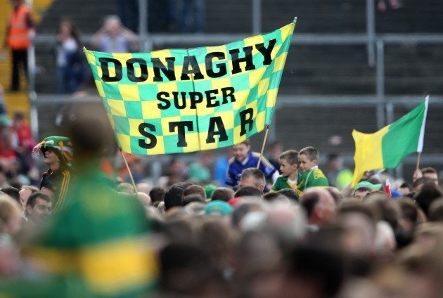 Kerry fans with a flag supporting Kieran Donaghy